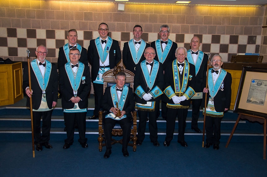 Worshipful Master Terry Moore, accompanied by his Officers of