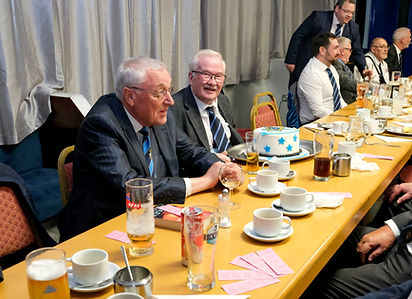 W.Bro. John McIlwaine presents W.Bro. Arthur Tumelty with a Birthday Cake to celebrate his 80th Birthday.     This was then followed by the Brethren singing the traditional Happy Birthday song to him.