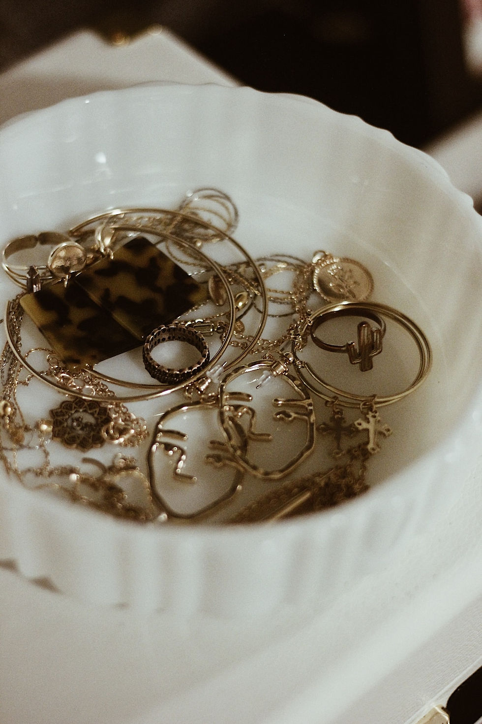 Jewelry in a white bowl