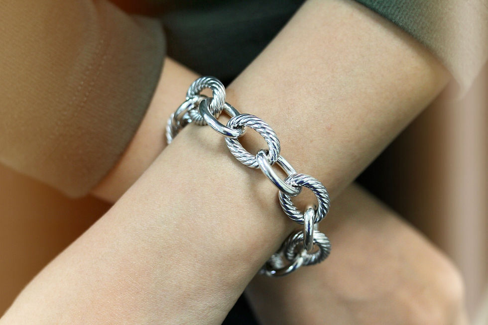 Silver bracelet on a woman's arm