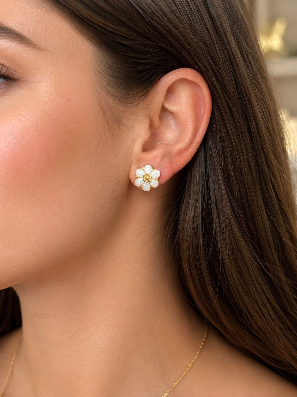 Lady showing off flower-shaped earrings