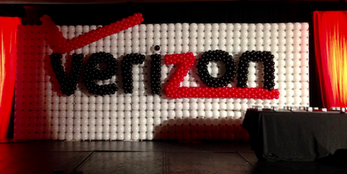 Verizon logo made from red and black balloons
