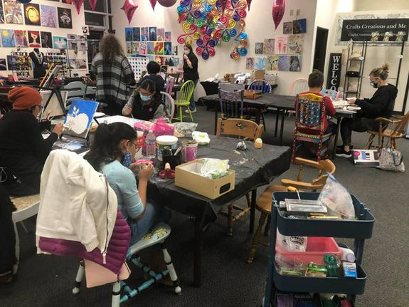 Kids painting and doing arts and crafts