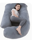 A woman lying on a grey supportive pregnancy pillow designed to cushion the body