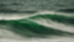 A wave cresting, with deep green tones_edited.jpg