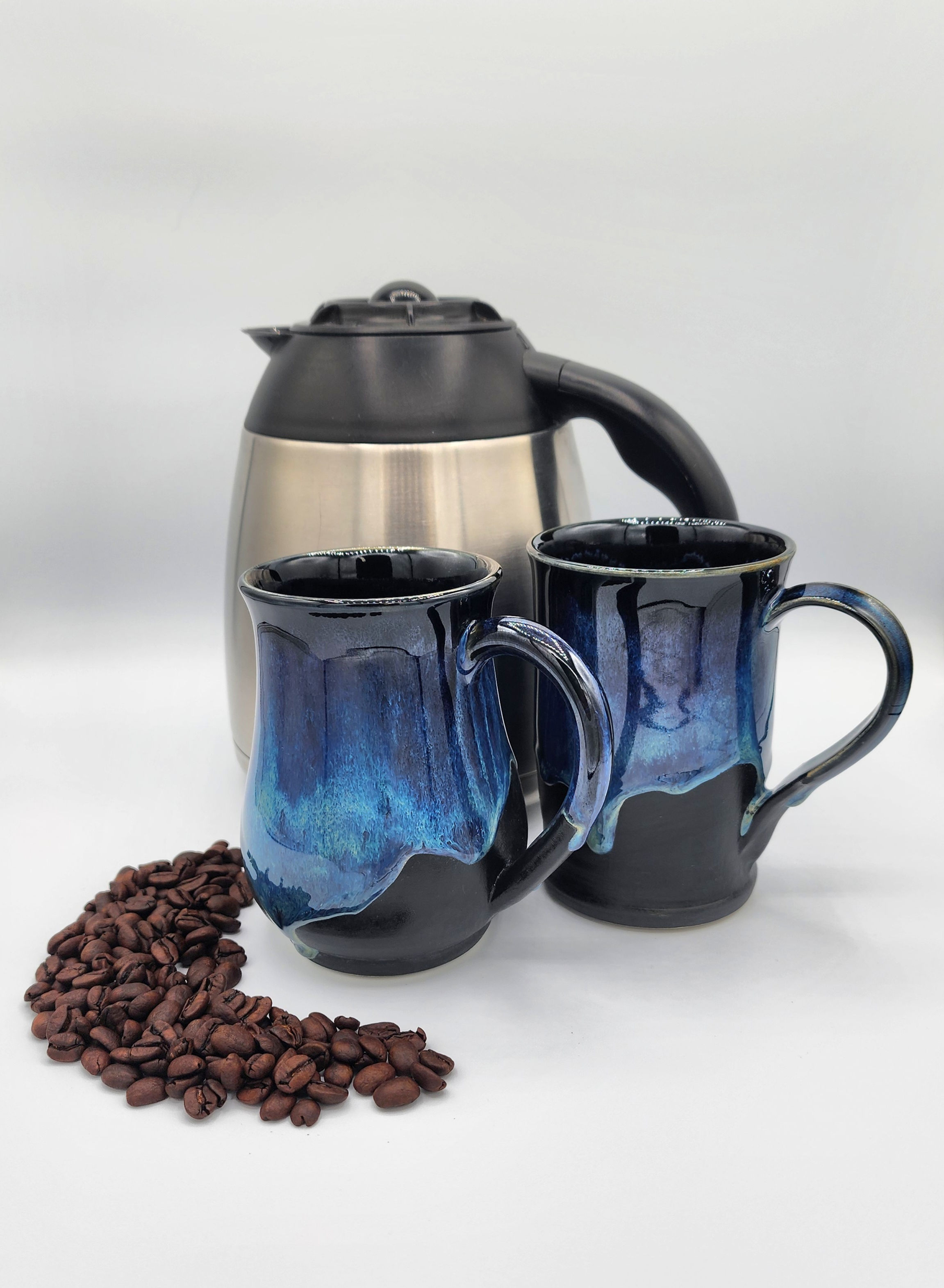Matte Black Mugs with running warm blues