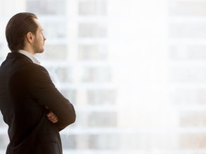 Man looking outside the window