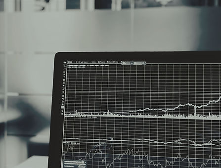 a computer showing market and stock trends