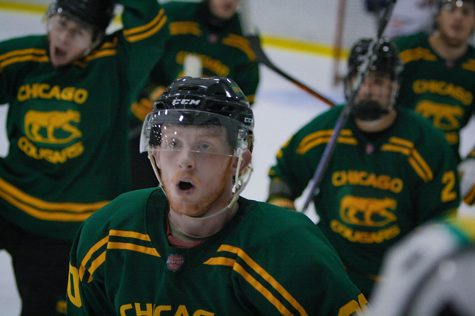 Chicago Cougars Forward #20 Brett Tumbrink and his line mates celebrate his goal on Friday | Photo by Sam Hartman