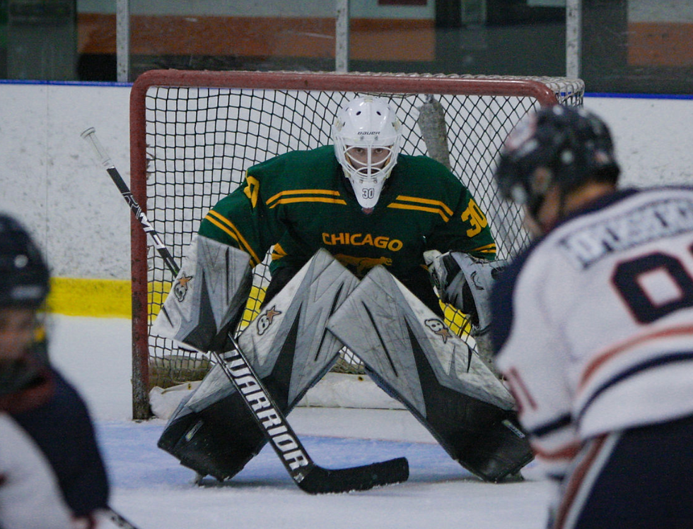 Chicago Cougars Goaltender #30 Nick Gingold stares down the puck | Photo by Sam Hartman