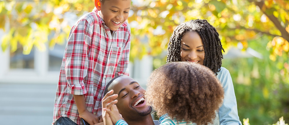 Black family playing together