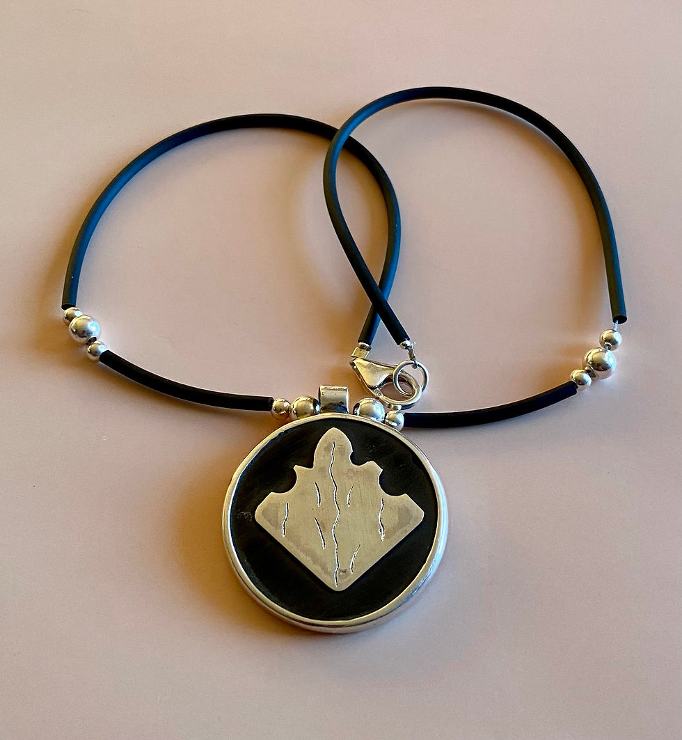 Small Sterling Silver and Ebony Talisman