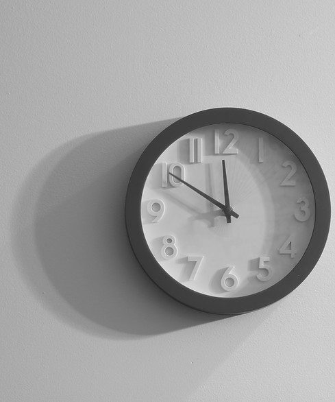 Image of a clock with a white face
