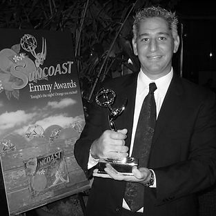 Hernan Spivak with his Emmy Award