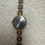 Thumbnail: Vintage Elizabeth Taylor Gold and Silver Quartz Watch with Crystal Accented Beze