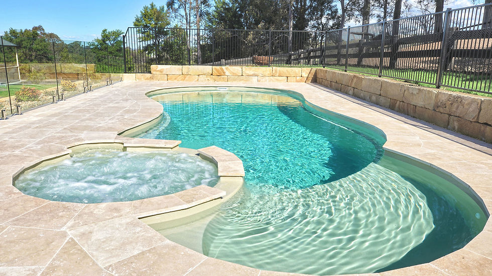 High angle view of a compact fibreglass pool with modern landscaping