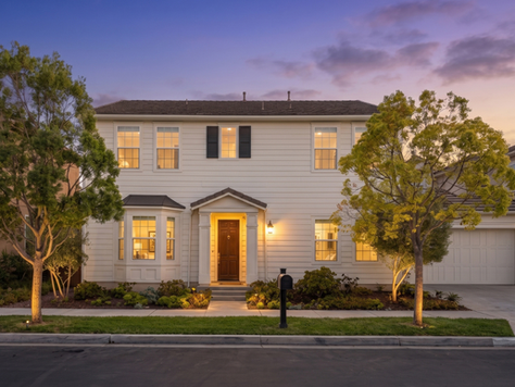 Front exterior view of 61 Windwalker, a detached two-story single-family home for sale in Tustin, CA 92782, built in 2017 with a north-south facing orientation, private driveway, and modern architectural design.