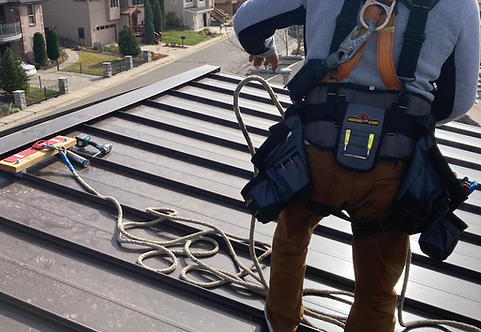 Metal roof installer, installing custom panels