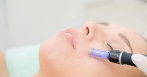 Clean, professional medical spa treatment room with neutral tones at BeRejuved Medical Spa & Wellness Studio - NYC in New York