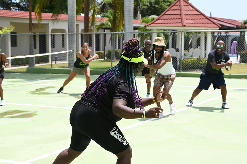 A Jamaican dance instructor leading The Athlete's Spa Retreat dancercise class