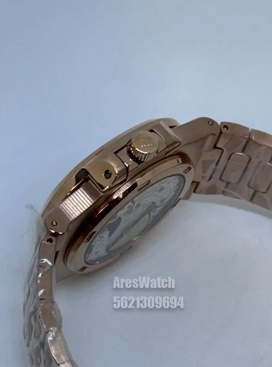 Miniatura: Patek Philippe Nautilus Rose Gold Moonphase Power Reserve Blue Dial