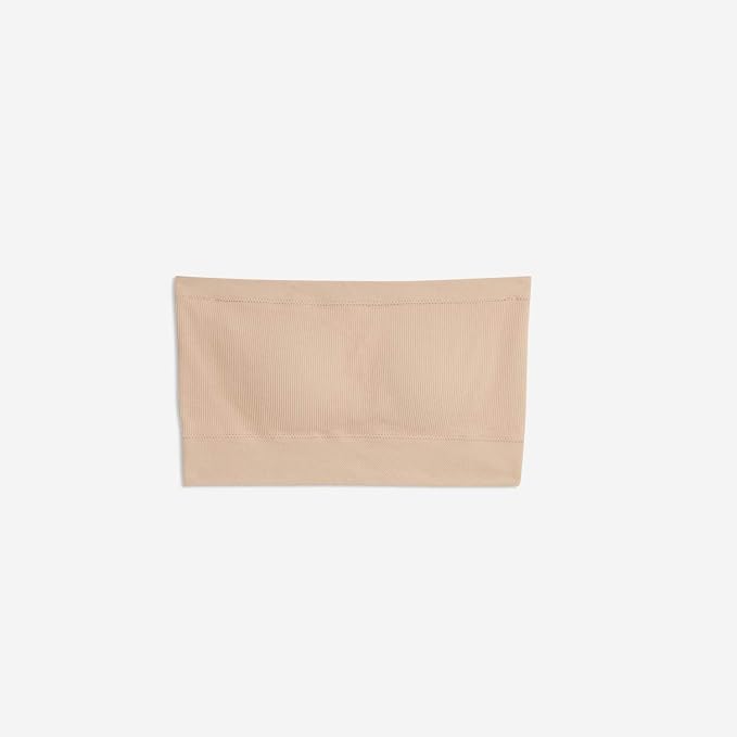 Beige seamless bandeau bra recommended by Shikha for styling deep armhole sleeveless tops