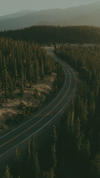 Motorcycle on CO RD 66 in Evergreen, Colorado_edited.jpg
