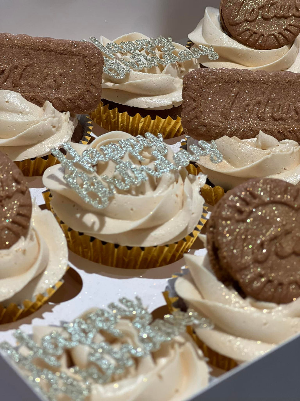 Box of delicious birthday cupcakes with chocolate