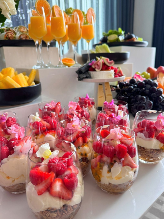 Delicious fruit parfaits and breakfast spread