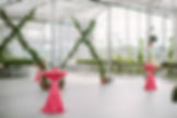 Bright pink event theme linen chair table rental for wedding shower at Grand Rapids Downtown Market in botanical garden
