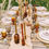 Thumbnail: Boho golden and amber glassware rental for head table near me in Grand Blanc, Michigan