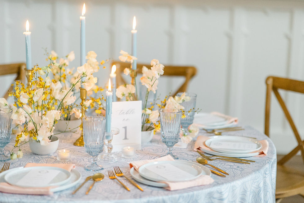 Soft modern wedding table with modern white plate rental in Michigan