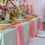Thumbnail: Bright coral guava pink napkin for tropical table setting rental near me in Michigan
