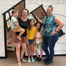 Dr. Beth with a family