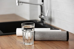 glass-of-filtered-water-with-filters-on-counter-2026-03-10-02-07-52-utc.JPG