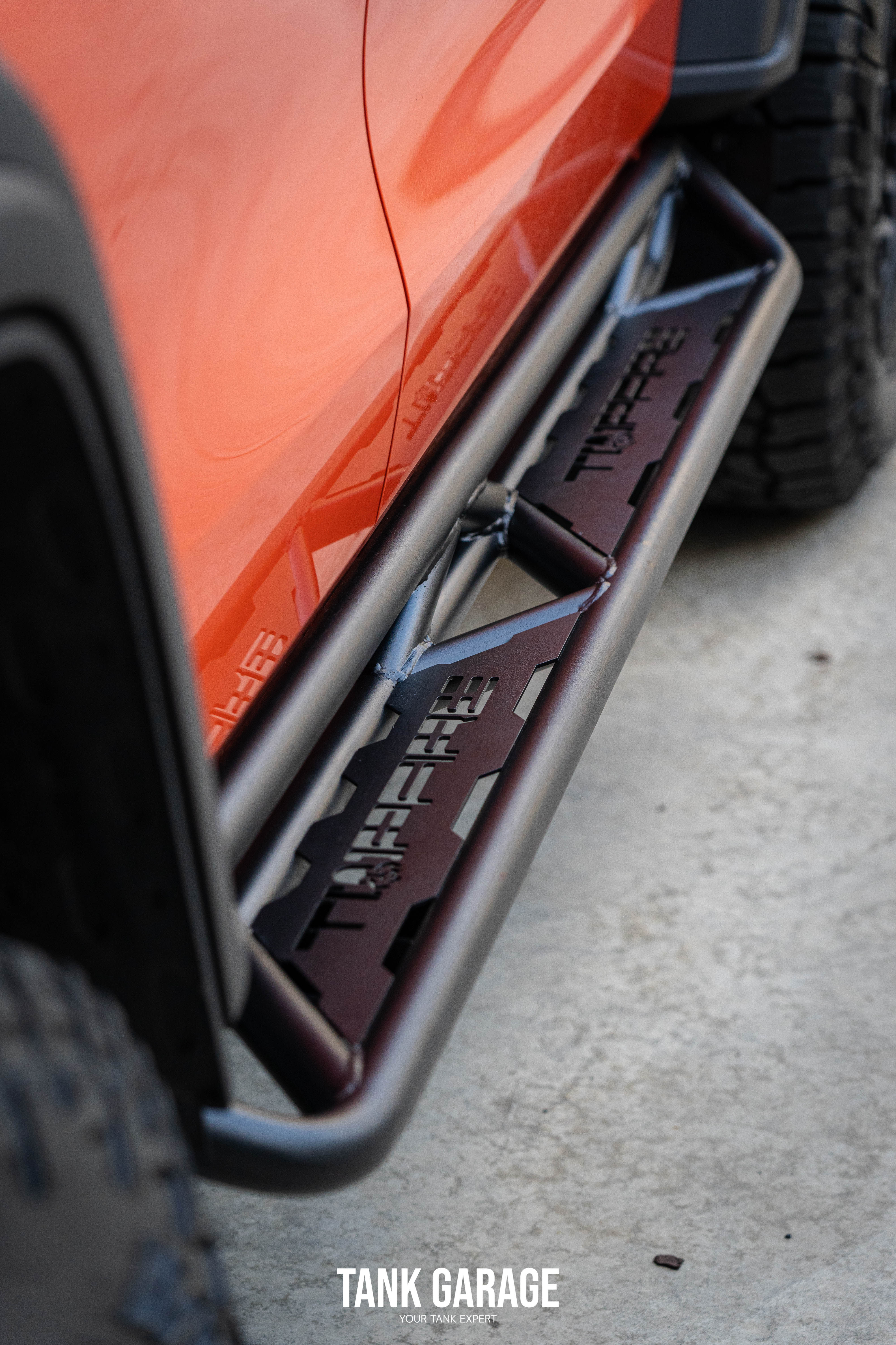 TKG side steps rock sliders