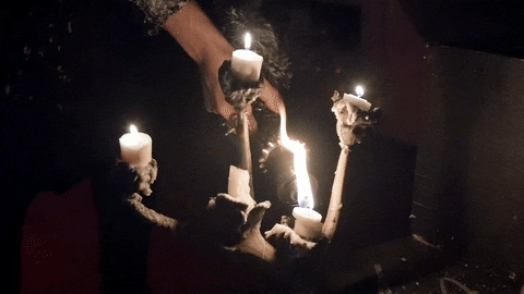 LIGHTING CANDLE.gif