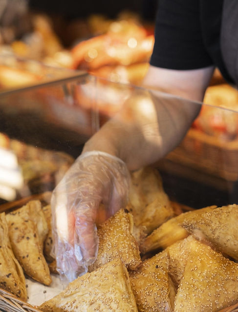 close-up-pastry-chef-preparing-food (1)-min_edited.jpg
