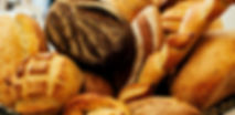 bunch-bread-loafs-table-min_edited.jpg