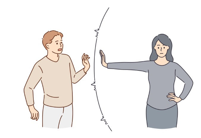 Image of a woman putting a boundary in place with a man