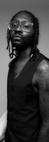 oulful R&B singer Dre Woods bringing emotion to the stage.