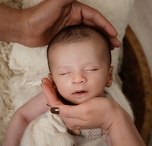 newborn with parents