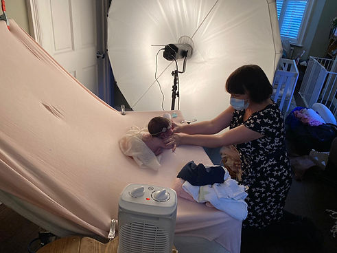 behind the scenes of a newborn session