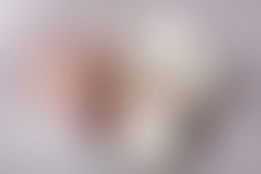 smiling newborn during an in-home newborn photography session