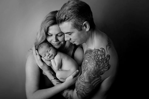 newborn-with-parents.jpg