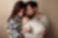 surrey couple with their newborn