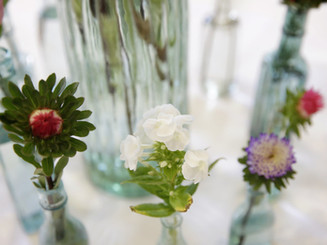 flower details in glass bottles