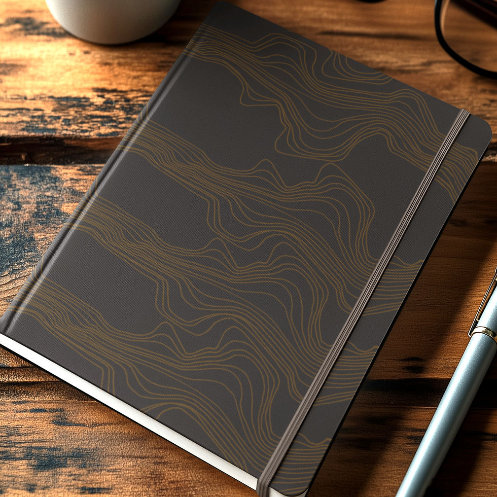 mockup-of-an-ai-generated-hardcover-journal-lying-on-a-table-with-a-pair-of-glasses-and-a-