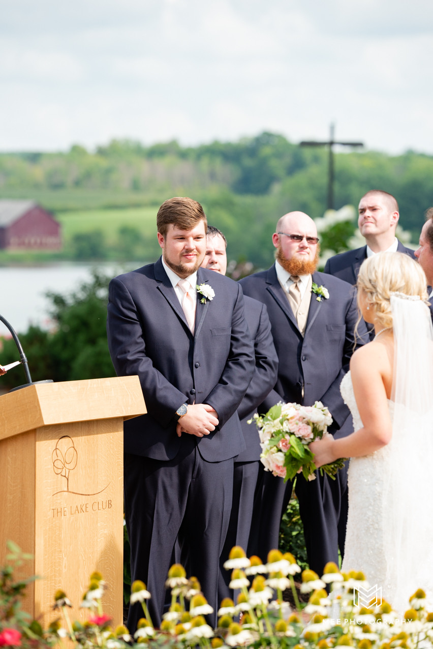 Dad handing over his daughter to the groom
