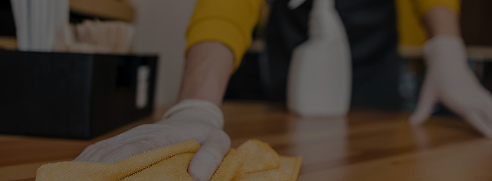 front-view-barista-cleaning-table_edited
